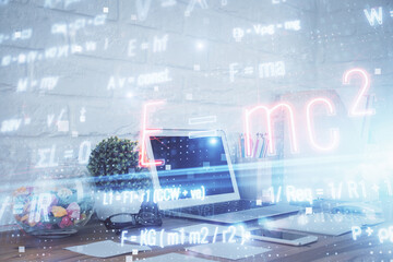 Desktop computer background and formula hologram writing. Double exposure. Education concept.