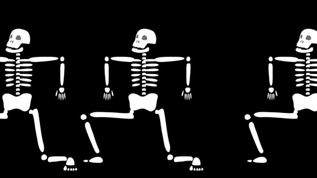 ハロウィンと死者の日に右から左へ腕を上げて大股で歩くガイコツ