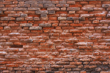 photo of red brick wall texture background