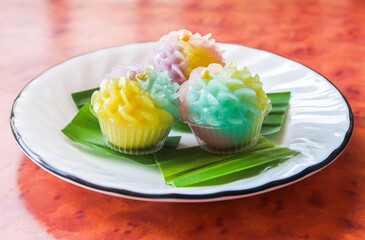 Thai dessert Kanom Chor Phaka stuff  with soybean, colourful thai sweet in flower shape