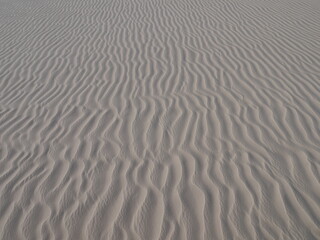 white sand ripples in the desert