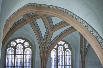 Prague, Czech Republic - 30 December 2019: the interior of the Klausen synagogue with a vaulted ceiling and decorated windows