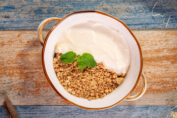 Breakfast homemade oatmeal granola with yogurt