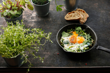 Traditional Tunisian breakfast. Ready dish served in a hot pan. Suggestion of serving the dish. food background
