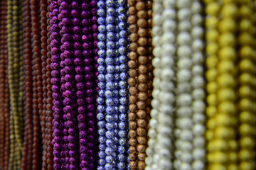 Colorful strings of beads ...