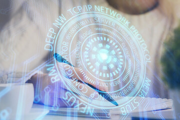 Fototapeta premium Multi exposure of writing hands on background with data solution hologram. Technology concept.
