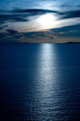 sunrise sunset moonlight over the sea