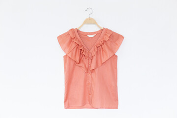 Woman blouse with Pink blouse cotton on white background.