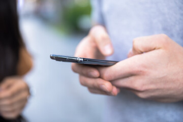 man hand smart phone