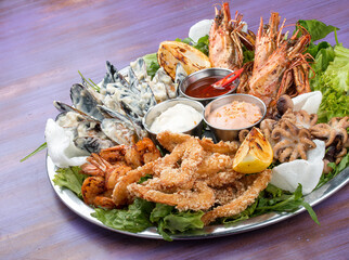 Seafood set. Langoustines, prawns, mussels, squid, octopus and sauces