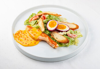Turkey fillet with vegetables, egg and red caviar sauce