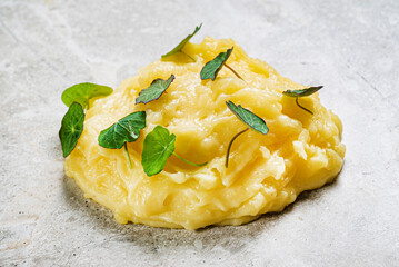 mashed potato with nasturtium leaves