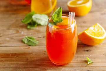Freshmade cocktail with oranges and mint