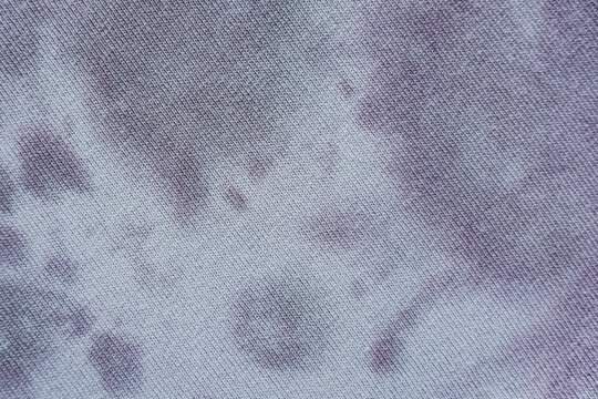 purple background, stained-knit fabric