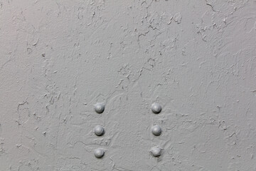 Old metal door with rivets