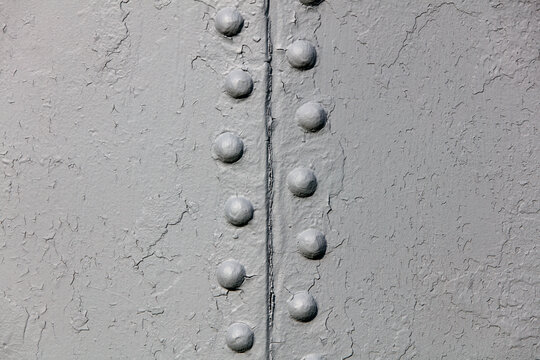 Old metal door with rivets