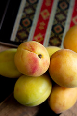 
Armenian apricots on a wooden table
