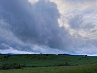 Fototapeta na wymiar Poland Pieniny. Storm clouds over the clearing.