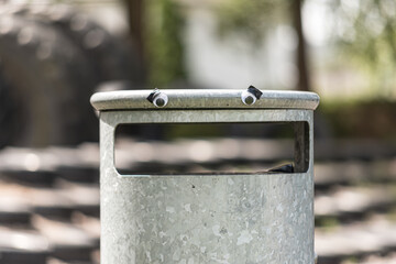 Googly eyes on a nervous trash can.