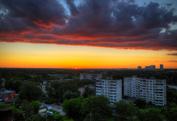 Fototapeta na wymiar Korolev city during sunset background