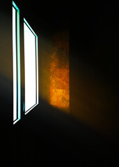 Ray of light illuminating closed door background