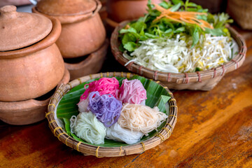 Thai food, Rice Noodle eaten with curry and fresh vegetable. or Fermented Rice Flour Noodles/ kanom...