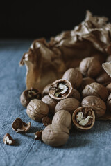 Walnuts on the table in craft bag