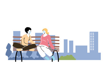 women in park sitting with mask on