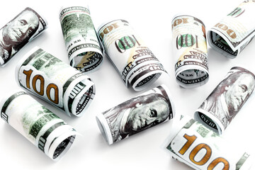 Money background. Rolled dollars banknote top view
