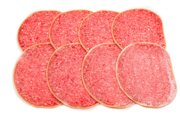 Tasty salami slices background.