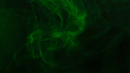 Green steam on a black background.