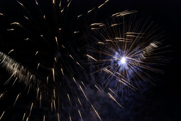 Sparkling fireworks display against the night sky. abstract background for celebration merry...