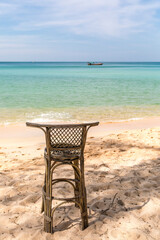 Bamboo Chair and Boat, Sunset beach, Koh Rong Samloem island, Sihanoukville, Cambodia.