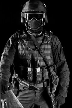 Portrait of a special forces soldier. The concept of military units. Computer games. Black and white photo/