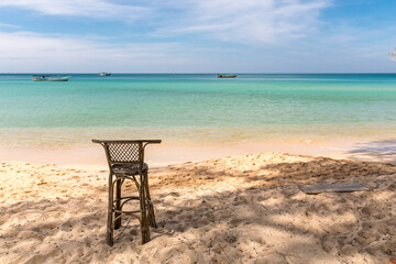 Bamboo Chair and Boat, Sunset beach, Koh Rong Samloem island, Sihanoukville, Cambodia.