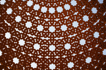 beautifully decorated pergola of Arab style in boardwalk promenade along coast of Muscate