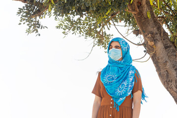 Portrait of a woman with a face mask