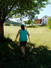 female farmer at hay work