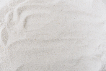 Fototapeta na wymiar The texture of the white river sand