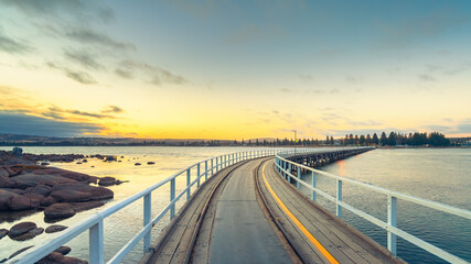Victor Harbor Causeway with no people at dusk viewed across the gulf
