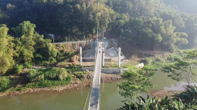 aerial view of the Pengkol suspension bridge in Imogiri Bantul, the bridge across the Oyo river
