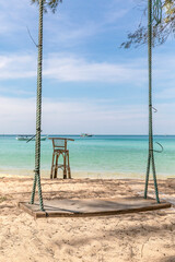 Obraz na płótnie Canvas Swing on the beach, Sunset beach, Koh Rong Samloem island, Sihanoukville, Cambodia.