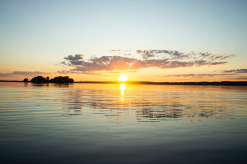 Magical fairytale sunset in the evening on the lake