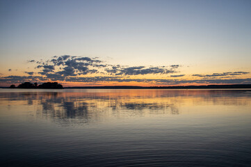 Magical fairytale sunset in the evening on the lake
