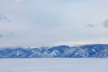 Fototapeta na wymiar Winter landscape. Baikal lake. Snowy mountains