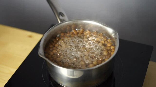 natural tapioca for bubble tea is boiled in a pan. tapioca cooking process. boba tea