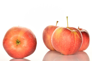Red ripe apples, close-up, on a white background.