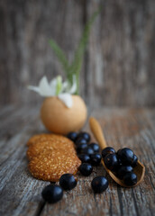 black olives on wooden background