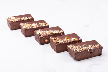 Set of five cakes impregnated with orange juice, with addition of raisins and carrots