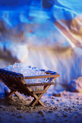 Christian Christmas concept. Birth of Jesus Christ. Wooden manger in cave background. Banner, copy...
